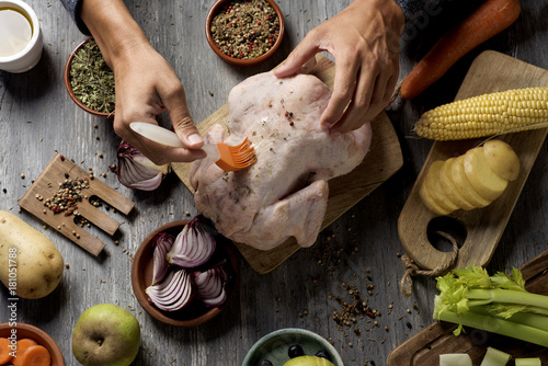 young man preparing a turkey