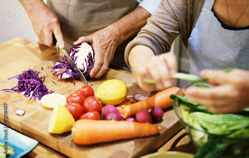 Senior couple cooking together in the kitchen