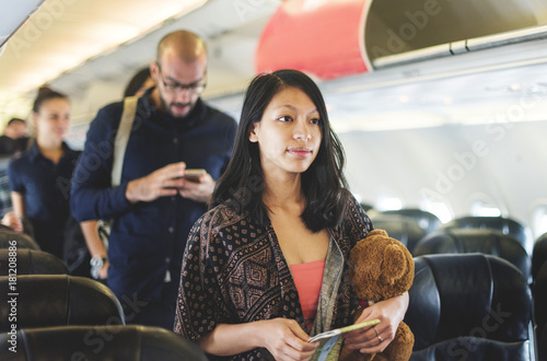 A girl traveling by airplane