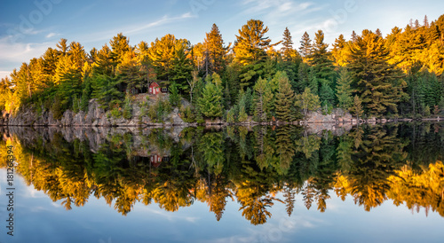 Autumn fall colours reflecting in lake