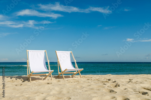 Deck chairs on beach