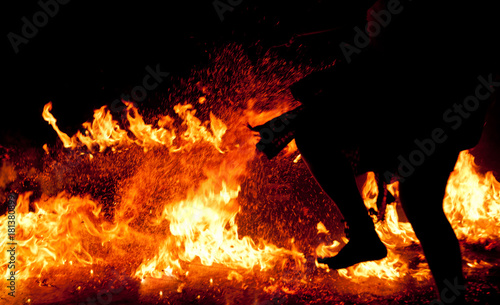 Burning fire stone on a floor background with step dance performance