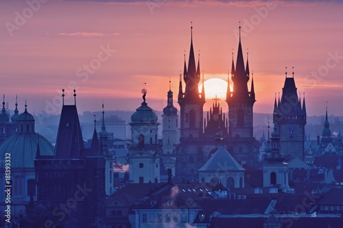 Sun disk between spires of the Prague Old Town Church of Our Lady before Tyn