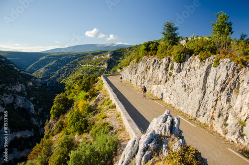 Cyclists on the Gorges de la Nesque road in Vaucluse Mountains region