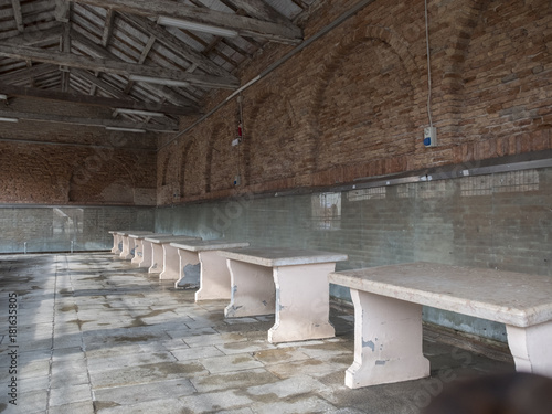 Comacchio, FE, Italy - November 4, 2017: Prospective view of the interior of the old Comacchio fish market.