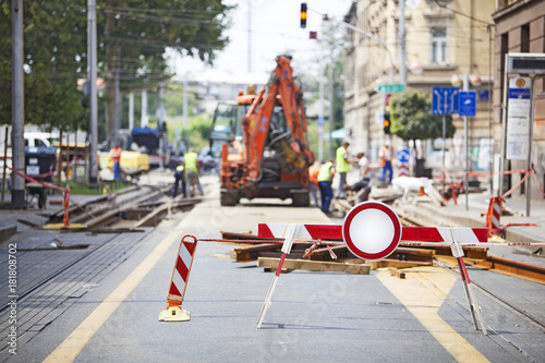 Workers repair the tram line in the city