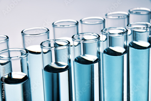 Row of full test tubes background