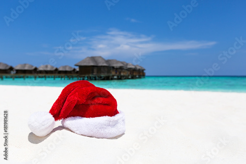 Santa hat on chair with water lodges on background