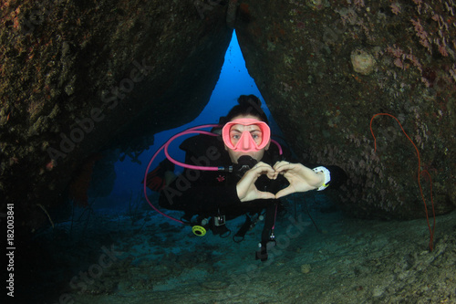 Young woman scuba diving