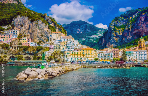  Wonderful Italy. The small haven of Amalfi village with a turquoise sea and colorful houses on the slopes of the coast.