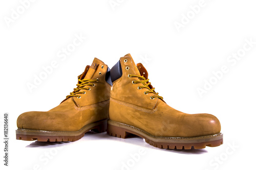Pair of brown hiking boots isolate on a white background