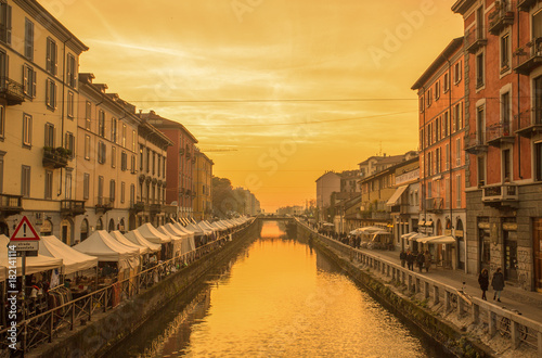 MILAN, ITALY, OCTOBER 13, 2017 - The Naviglio Grande canal at sunset in Milan, Italy