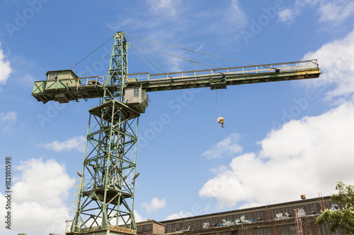 Stocznia Gdanska industrial factory with shipyard cranes