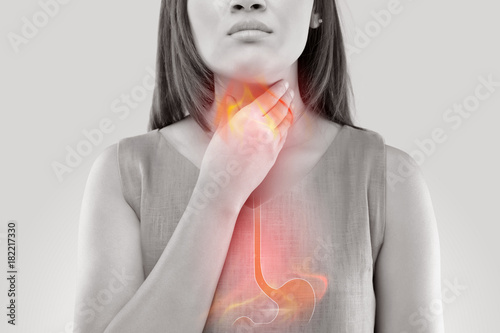 Woman Suffering From Acid Reflux Or Heartburn-Isolated On White Background