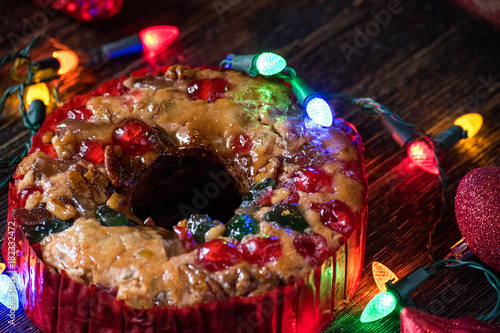 Christmas fruitcake with festive lights