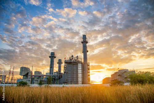 Turbine electric power plant building during sunset time on nature background