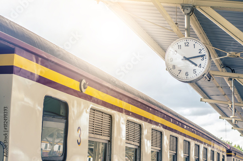 Classic urban analog clock in train station terminal. Concept photo of time, appointment, deadline, meeting, business, travel and schedule..