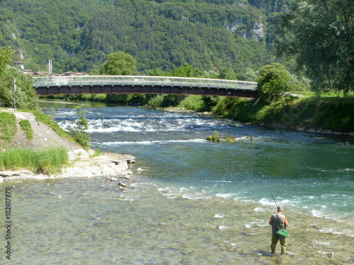 Fishing sport in a mountain river of Upper Lombardy