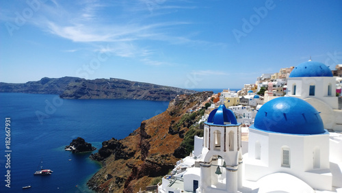 The famous blue domes of the buildings in Oia on Santorini