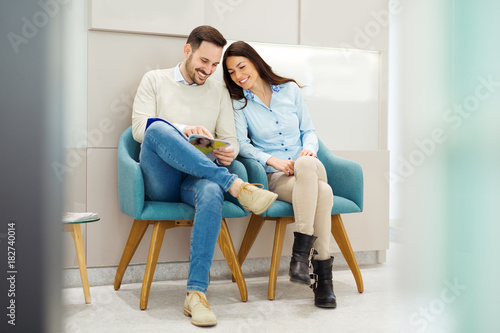 Patients sitting in a waiting room