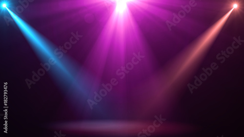 abstract of empty stage with colorful spotlights or Several bright projectors for scene lighting effects . can be used for display or montage your products