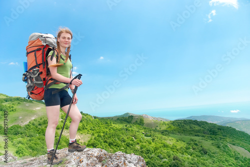 Hiking woman with backpack