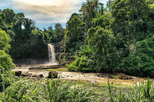 big and magical waterfall in bali. indonesia