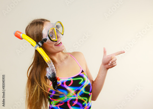 Woman with snorkeling mask having fun