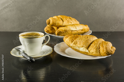 Coffee and croissant for breakfast.