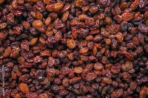 Raisins close-up top view. Background, texture.