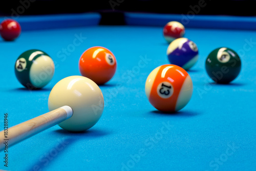 Billiard pool eightball taking the shot on billiard table