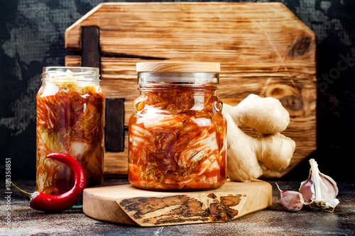 Cabbage kimchi glass jar. Korean traditional cuisine. Fermented food.