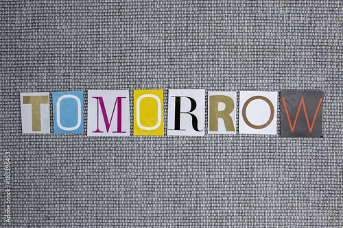 tomorrow word on grey background