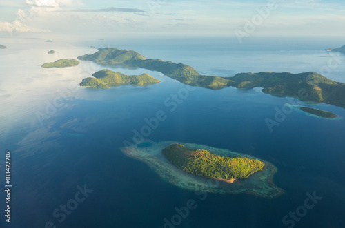 Aerial view over beautiful Philippine islands and deserted beaches.