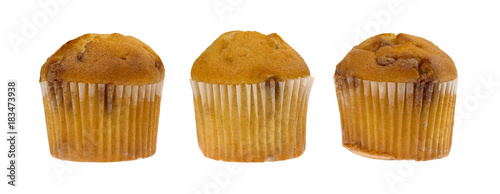 Side view of three bite size apple spice muffins isolated on a white background.