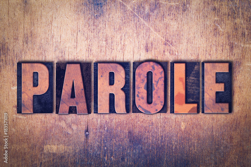 Parole Theme Letterpress Word on Wood Background