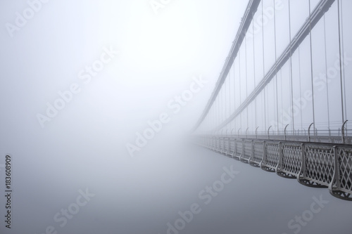 Clifton Suspension Bridge in the fog from the side