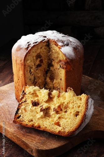 Classic panettone with dried fruit ,traditional Italian Christmas cake