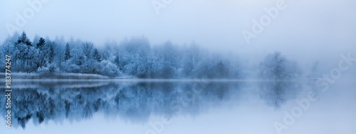 Morning reflections on the iced lake.