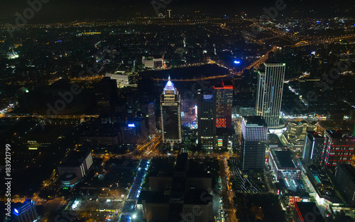 Taipei's colorful cityscape at night. Visible noise due to high ISO and wide aperture.