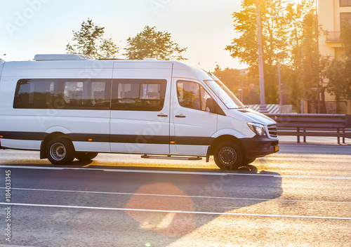  minibus goes on the city street