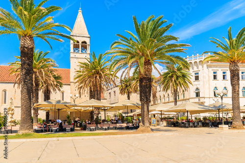 TROGIR TOWN, CROATIA - SEP 6, 2017: historical buildings and church in old town of Trogir on sunny summer day, Dalmatia, Croatia.