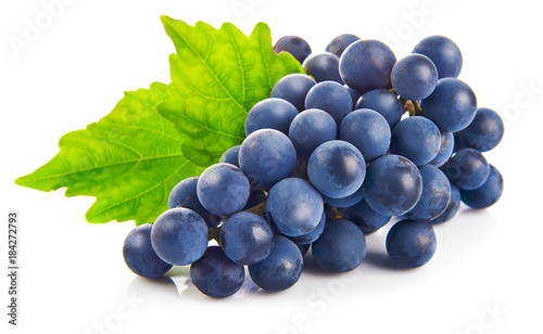 Blue grapes with green leaf healthy eating, isolated on white