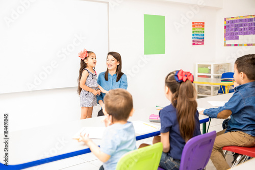 Preschool student reciting a poem