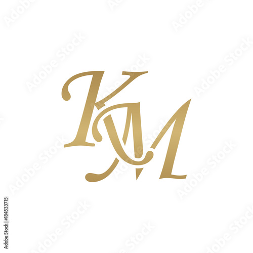 Initial letter KM, overlapping elegant monogram logo, luxury golden color