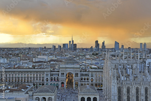 Italy - Milan december 13,2017 - Duomo cathedral, Vittorio Emanuele Gallery and skyline during the sunset 