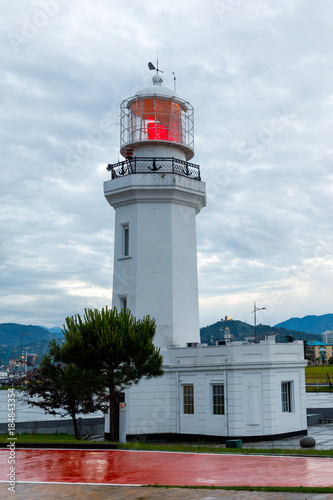 Seafront Promenade on Black Sea coast with lighthouse view in Batumi