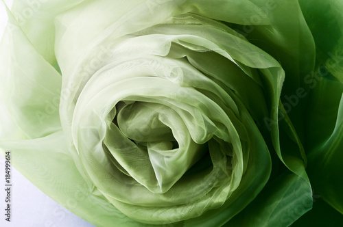 green closeup organza fabric wavy texture