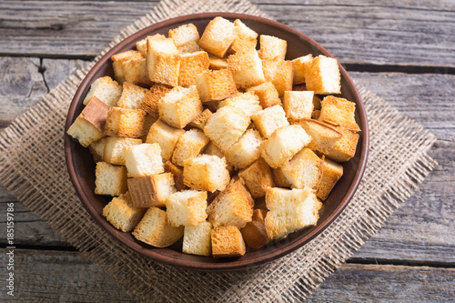 Crispy croutons in bowl