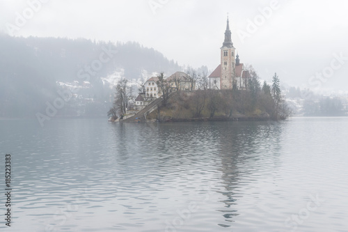Lake Bled in winter mist, Triglav national park slovenia